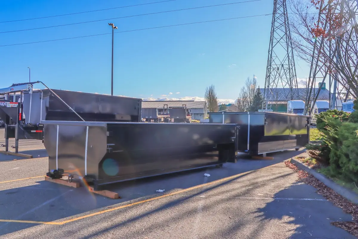 Roll-off dumpster ready for waste disposal at job site for Concrete Dumpster Rental in Cortlandville